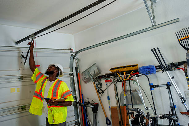 Professional Garage Door Installation technician working in Plainview, NE
